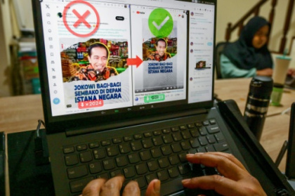 'One-sided war' Indonesians join forces to bust election disinfo.jpg
