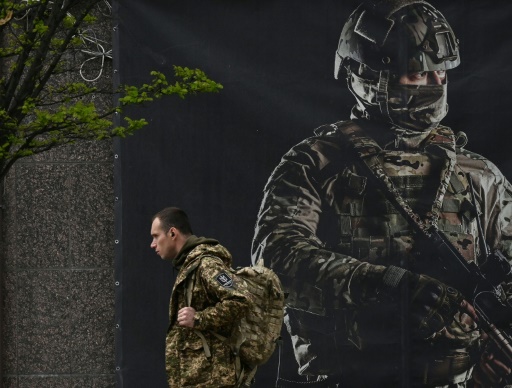 Ukraine pushes military-aged men to return home
