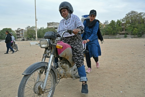 Pakistan's women 'Rowdy Riders' take on traffic and tradition