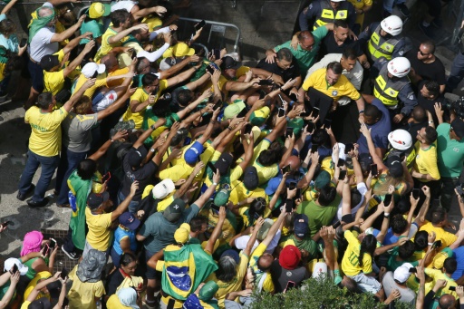 Brazil's Bolsonaro slams election ban as thousands rally behind him