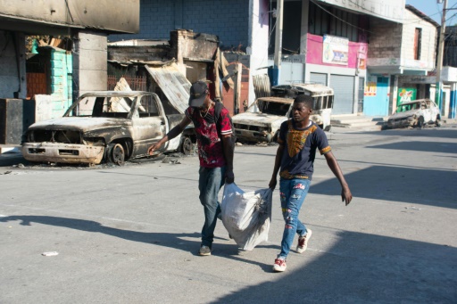Haiti works at govt transition as gang leader vows to fight on