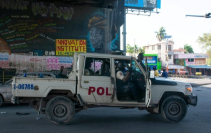 Police station set alight as violence grips troubled Haiti.jpg