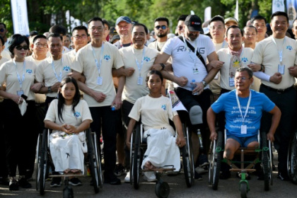 Survivors, sniffing dogs join anti-mine march at Cambodia's Angkor Wat.jpg Survivors, sniffing dogs join anti-mine march at Cambodia's Angkor Wat.jpg