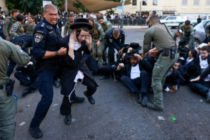 Israeli security personnel in Jerusalem disperse ultra-Orthodox Jewish protesters opposed to conscription, on October 31, 2024 Israeli security personnel in Jerusalem disperse ultra-Orthodox Jewish protesters opposed to conscription, on October 31, 2024