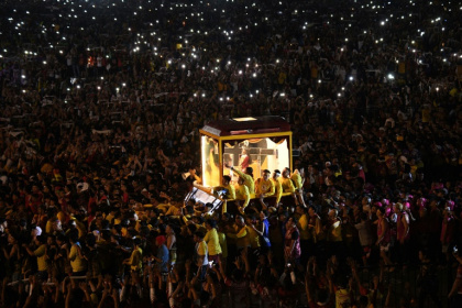 The black statue of Jesus of Nazarene leaves a park following a mass during an annual religious procession in Manila on Thursday The black statue of Jesus of Nazarene leaves a park following a mass during an annual religious procession in Manila on Thursday