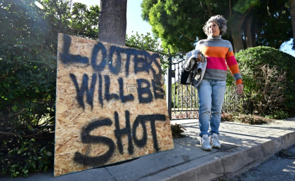 Evacuees have become increasingly nervous about looters roaming empty neighborhoods and poluice have stepped up patrols in a bid to deter criminals Evacuees have become increasingly nervous about looters roaming empty neighborhoods and poluice have stepped up patrols in a bid to deter criminals