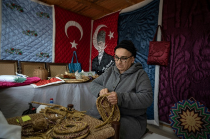 Traditional quilt artist Nahya Guzelyurt works in the Antakya Art and Culture Market Traditional quilt artist Nahya Guzelyurt works in the Antakya Art and Culture Market