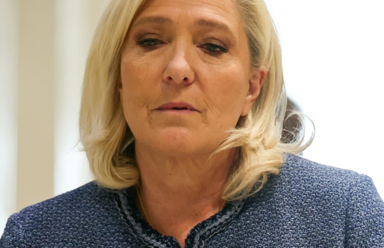 France's Le Pen seeks to keep presidency hopes alive after election ban