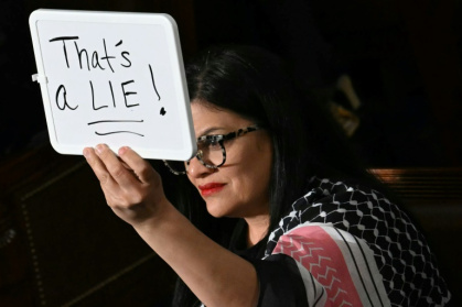 Democratic Congresswoman Rashida Tlaib protests against President Donald Trump during his speech to Congress Democratic Congresswoman Rashida Tlaib protests against President Donald Trump during his speech to Congress
