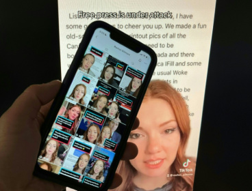 Photo illustration created December 15, 2022, in Washington, DC, shows a person holding up the TikTok feed of Canadian journalist Rachel Gilmore against the backdrop of one of her online posts. Photo illustration created December 15, 2022, in Washington, DC, shows a person holding up the TikTok feed of Canadian journalist Rachel Gilmore against the backdrop of one of her online posts.