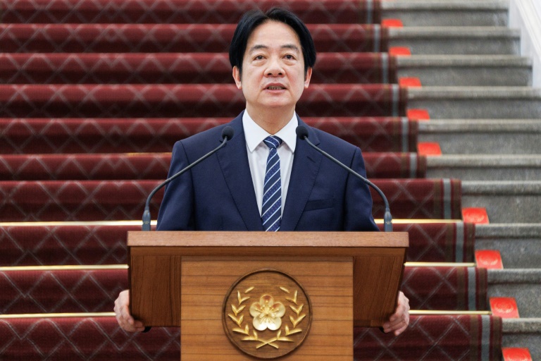 Taiwan says 'willing' to talk to China as island boosts defences