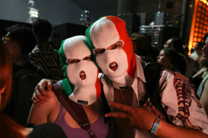 Fans of Irish hip hop trio Kneecap wait for the band to perform at the Coachella Festival in California - VALERIE MACON (AFP) Fans of Irish hip hop trio Kneecap wait for the band to perform at the Coachella Festival in California - VALERIE MACON (AFP)