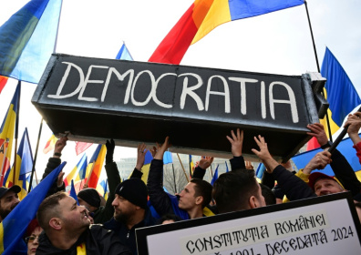 Thousands have protested the annulling of the initial vote, denouncing what they called a 'coup' - Daniel MIHAILESCU (AFP) Thousands have protested the annulling of the initial vote, denouncing what they called a 'coup' - Daniel MIHAILESCU (AFP)