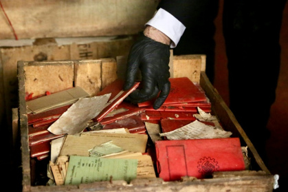The crates contained Nazi-themed postcards, photographs, progapanda material, notebooks and party membership documents - Handout (AFP) The crates contained Nazi-themed postcards, photographs, progapanda material, notebooks and party membership documents - Handout (AFP)