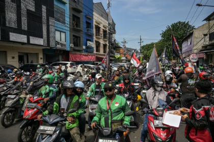 Gig economy drivers protested in Indonesia demanding a 10 percent cap on commission fees - JUNI KRISWANTO (AFP) Gig economy drivers protested in Indonesia demanding a 10 percent cap on commission fees - JUNI KRISWANTO (AFP)