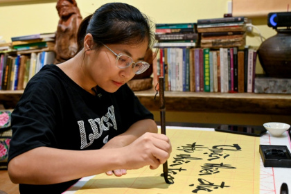 The history of romanised Vietnamese, or "Quoc Ngu", links the arrival of the first Christian missionaries, colonisation by the French and the rise to power of the Communist Party - Nhac NGUYEN (AFP) The history of romanised Vietnamese, or "Quoc Ngu", links the arrival of the first Christian missionaries, colonisation by the French and the rise to power of the Communist Party - Nhac NGUYEN (AFP)