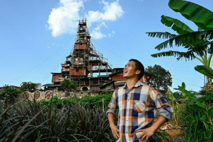 Chen Tianming refused to leave his village, which was mostly razed to build a tourist resort - Pedro PARDO (AFP) Chen Tianming refused to leave his village, which was mostly razed to build a tourist resort - Pedro PARDO (AFP)