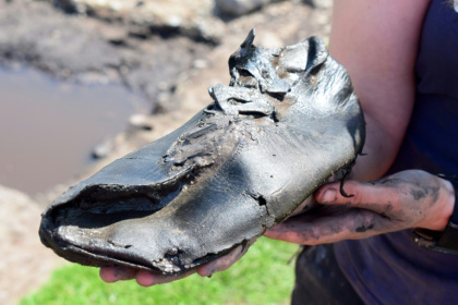 A handout photo released by The Vindolanda Trust shows a complete leather shoe, one of 32 shoes uncovered so far during excavations in Northern England - - (AFP) A handout photo released by The Vindolanda Trust shows a complete leather shoe, one of 32 shoes uncovered so far during excavations in Northern England - - (AFP)