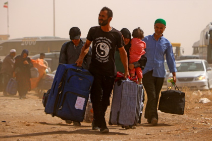The number of Afghans crossing the border from Iran has surged ahead of a July 6 deadline set by Tehran for undocumented Afghans to leave - Mohsen KARIMI (AFP)