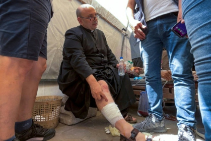 The priest of Holy Family Church in Gaza City, Father Gabriel Romanelli, was injured in the strike - Omar AL-QATTAA (AFP) The priest of Holy Family Church in Gaza City, Father Gabriel Romanelli, was injured in the strike - Omar AL-QATTAA (AFP)
