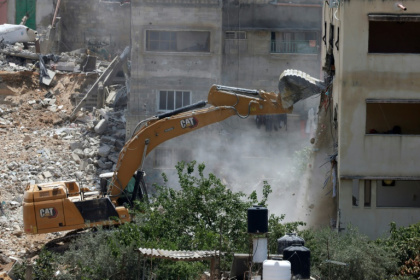 An Israeli military bulldozer demolishes a home at the Nur Shams Palestinian refugee camp in the Israeli occupied West Bank on June 23, 2025 - Jaafar ASHTIYEH (AFP) An Israeli military bulldozer demolishes a home at the Nur Shams Palestinian refugee camp in the Israeli occupied West Bank on June 23, 2025 - Jaafar ASHTIYEH (AFP)