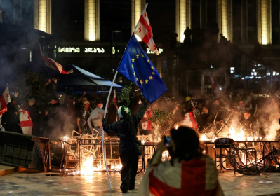 Saturday saw protesters burn barricades and clash with police during an opposition rally on the day of local elections - GIORGI ARJEVANIDZE (AFP)