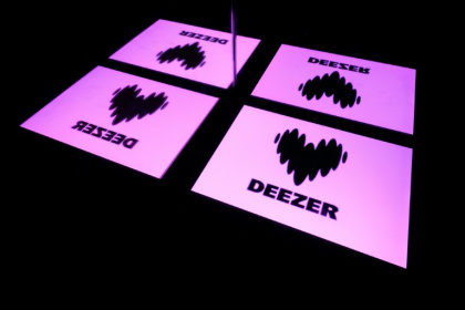 Deezer said AI-generated tracks have surged from one in 10 streamed at the beginning of the year to one in three - Lionel BONAVENTURE (AFP)