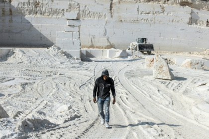 Quarry work in the occupied West Bank is tough, but there are few other options available in the territory's wilting economy - JOHN WESSELS (AFP)