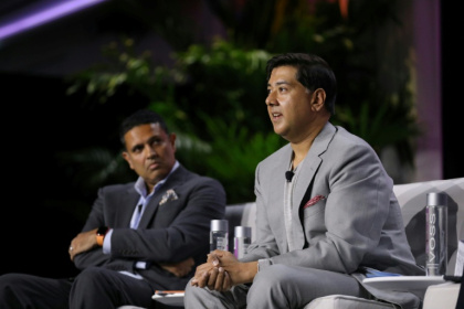 Imran Ahmed (right), pictured with Hari Sreenivasan, is a British national and US permanent resident - JP Yim (AFP)