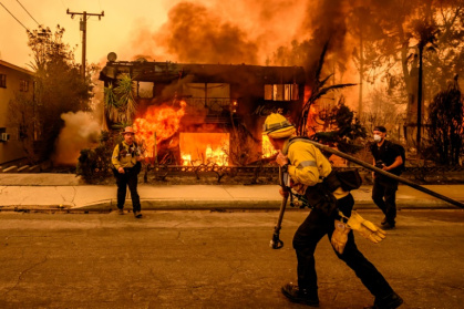 The Los Angeles wildfires were the costliest natural disasters of 2025, according to Munich Re - JOSH EDELSON (AFP)