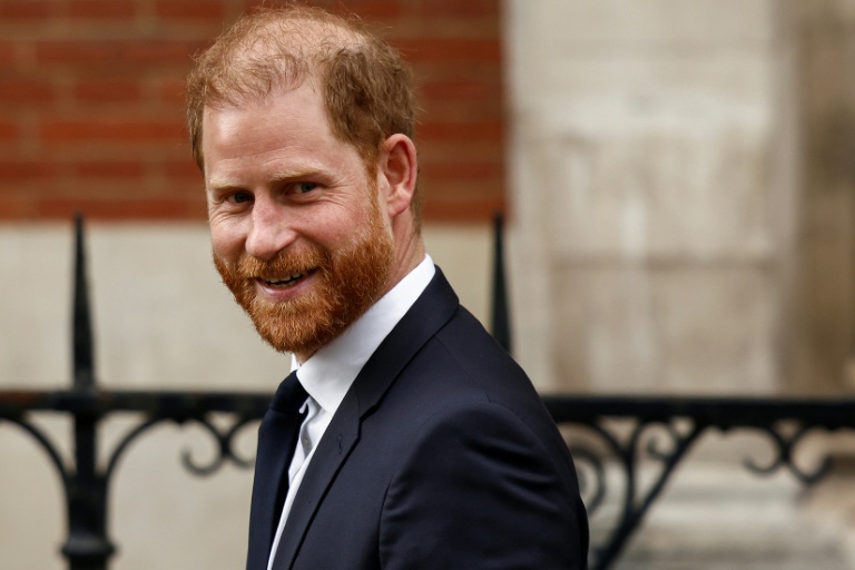 Prince Harry accuses tabloids of making wife's life 'absolute misery'
