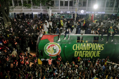 Senegal's football team celebrates winning the Africa Cup of Nations, traveling in a victory parade through Dakar on January 20, 2026 - Carmen Abd Ali (AFP)