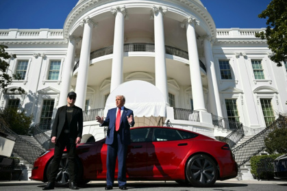 Teslas can already self-drive in the US -- where Elon Musk worked with President Donald Trump for a while, before they had a falling-out - Mandel NGAN (AFP)