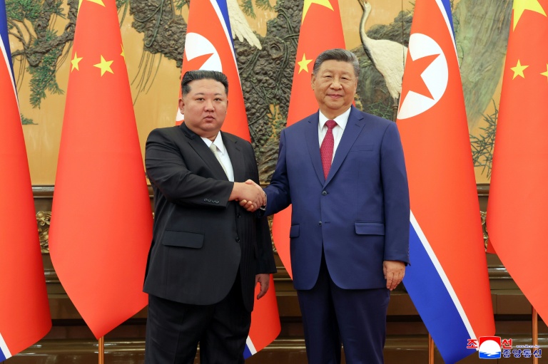China's Xi lands in North Korea for rare visit