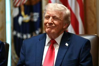 US President Donald Trump has positioned himself as an advocate for rapid AI development - Kent NISHIMURA (AFP)