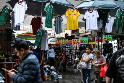Counterfeit sports jerseys are the target of a crackdown ahead of the FIFA World Cup in Mexico City - Yuri CORTEZ (AFP)