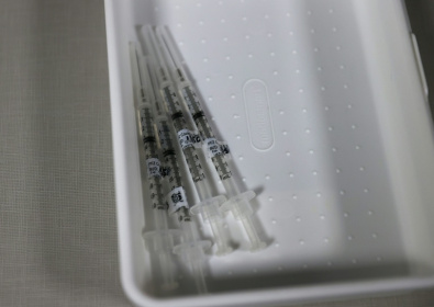 Vaccines are 'always chasing the virus', said Jonathan Heeney from Cambridge University - JOE RAEDLE (AFP)