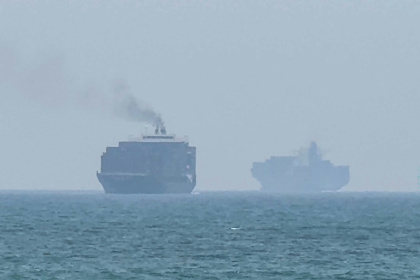 Cargo ships anchoring near the Strait of Hormuz off the eastern coast of the United Arab Emirates at Khor Fakkan - - (AFP)