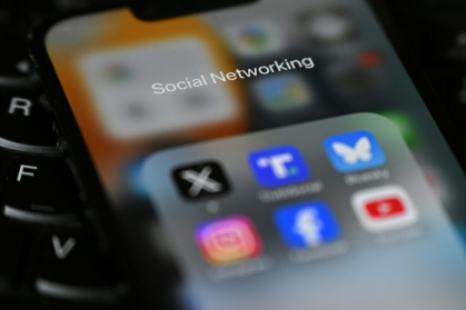UK teens plan to opt out of social media curfews proposed by the government - Justin TALLIS (AFP)