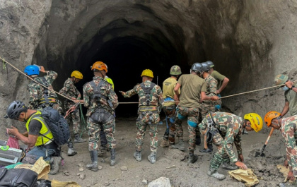 A handout photograph taken by the Nepal Army shows personnel conducting a search and rescue operation at the Rasuwagadhi Hydropower project in Rasuwa - Handout (AFP)