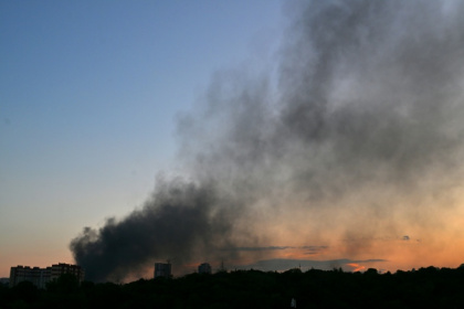 Smoke rising over Kyiv following a drone strike. Unmanned aerial vehicles have become crucial in the Ukraine war, with both Kyiv and Moscow relying on them - Sergei SUPINSKY (AFP)