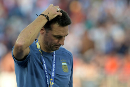 Argentina coach Lionel Scaloni has a big hole to fill after the international retirement of Lionel Messi - JUAN MABROMATA (AFP)