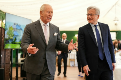 Nvidia boss Jensen Huang (R) was among the guests - Jonathan Brady (AFP)