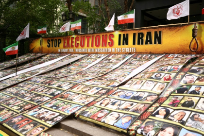 There was a vigil outside the UN Tuesday with protesters demonstrating against Tehran's use of the death penalty - CHARLY TRIBALLEAU (AFP)