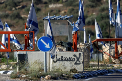 Graffiti reading "no future" in Arabic is depicted on a concrete block at the closed vehicle barrier of the Ein Sinya checkpoint at the northern entrance of Ramallah - Zain JAAFAR (AFP)
