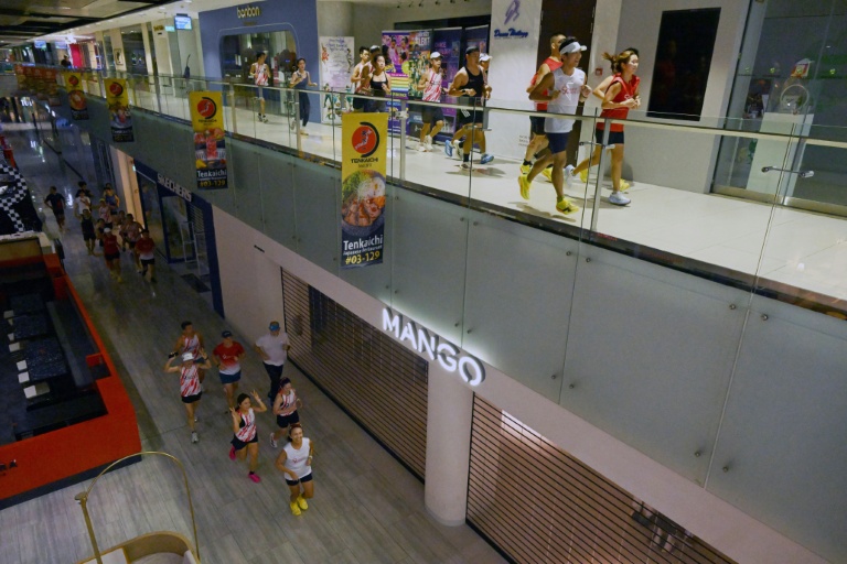 Runners swap streets for shopping malls as haze chokes Singapore
