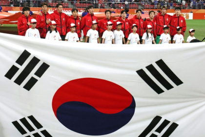 This picture taken on October 3, 2026 shows South Korea's players singing the national anthem at the Asian Games - - (AFP)