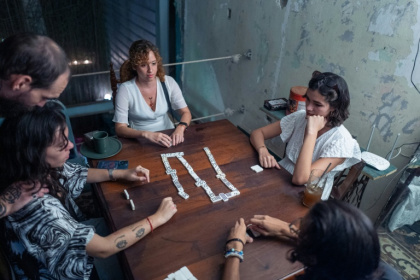 Dominoes 'keeps us united,' said 24-year-old Melanie Tejeda in Cuba - ADALBERTO ROQUE (AFP)
