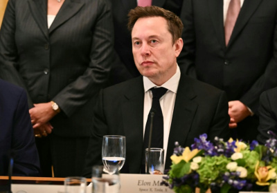 Elon Musk's rocket and AI company posted net income of $4.4 billion for the July-September period - Kent NISHIMURA (AFP)